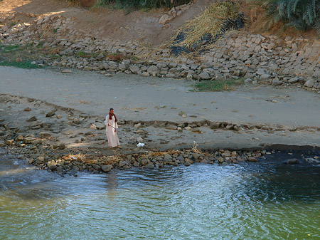 Mann am Wasser Foto 