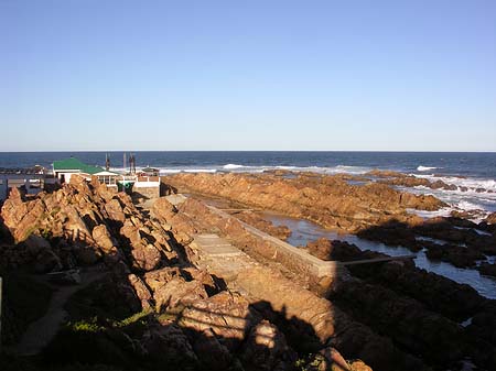 Felsenküste von Mossel Bay Fotos
